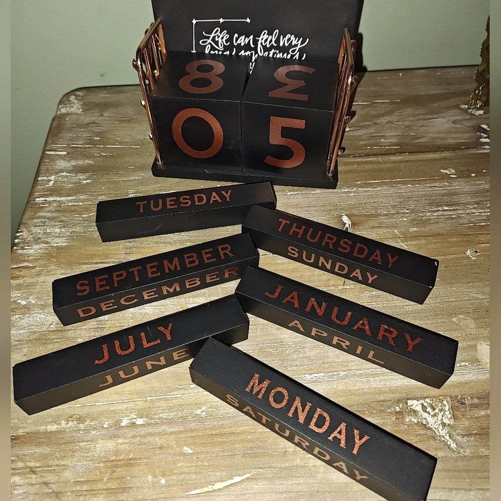OwlCrate The Invisible Life of Addie LaRue wooden block desk calendar